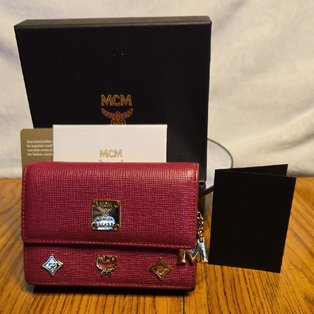 MCM Raspberry Pink Leather Double Flap Wallet with Gold Hardware And Charm